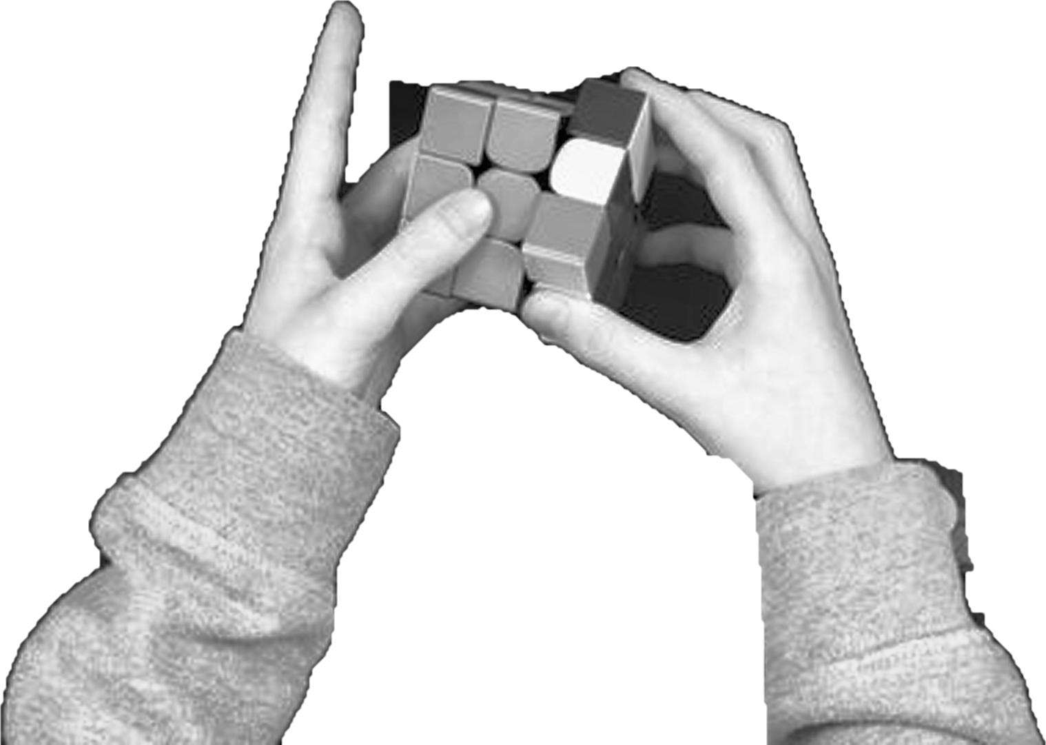 Two hands solving a Rubik's cube